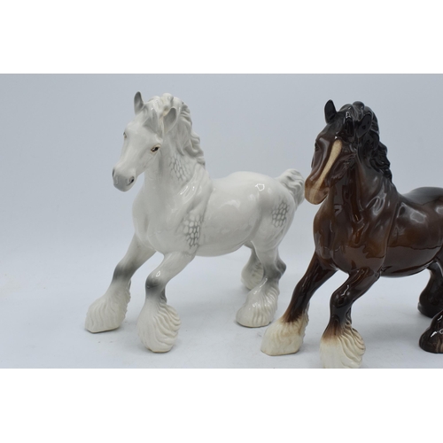 183 - Beswick Cantering Shires 975 to include a brown and a grey example (2). In good condition with no ob... 