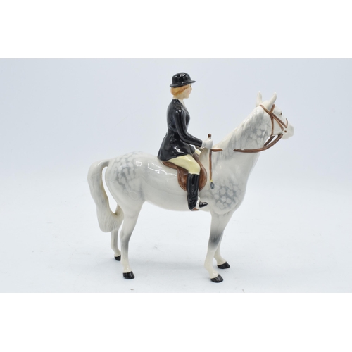 187 - Beswick Huntswoman on Grey horse 1730. 21cm tall. In good condition with no obvious damage or restor... 