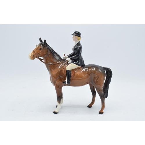 188 - Beswick Huntswoman on Brown horse. 21cm tall. In good condition with no obvious damage or restoratio... 