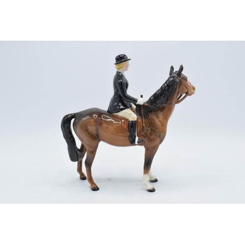 188 - Beswick Huntswoman on Brown horse. 21cm tall. In good condition with no obvious damage or restoratio... 