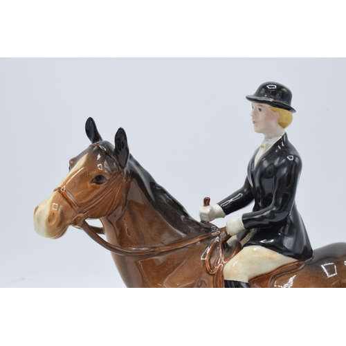 188 - Beswick Huntswoman on Brown horse. 21cm tall. In good condition with no obvious damage or restoratio... 