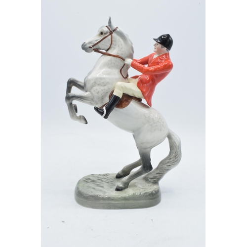 188A - Beswick rearing huntsman on grey horse 868. 24cm tall. In good condition with no obvious damage thou... 