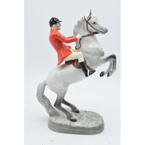 188A - Beswick rearing huntsman on grey horse 868. 24cm tall. In good condition with no obvious damage thou... 