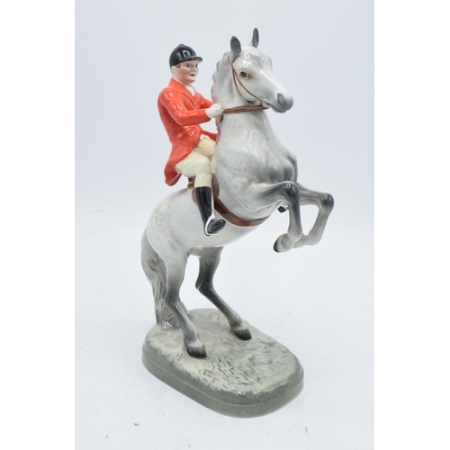 188A - Beswick rearing huntsman on grey horse 868. 24cm tall. In good condition with no obvious damage thou... 