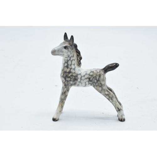 194 - Beswick rocking horse grey foal 763. 8.5cm tall. It appears to be in good condition though upon clos... 