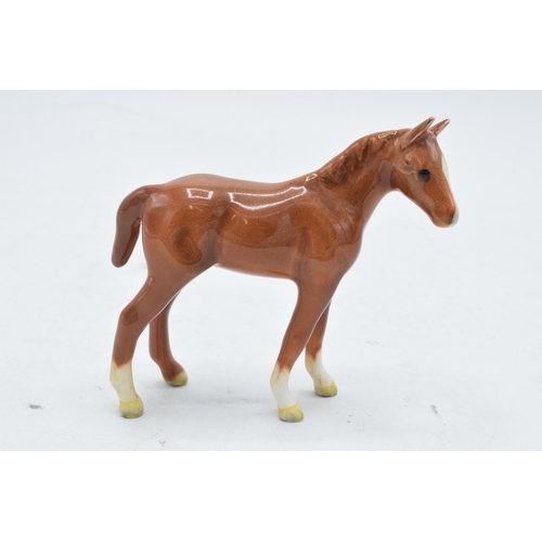 195 - Beswick chestnut thoroughbred foal facing right 1817. 8cm tall. In good condition with no obvious da... 