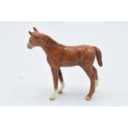 195 - Beswick chestnut thoroughbred foal facing right 1817. 8cm tall. In good condition with no obvious da... 