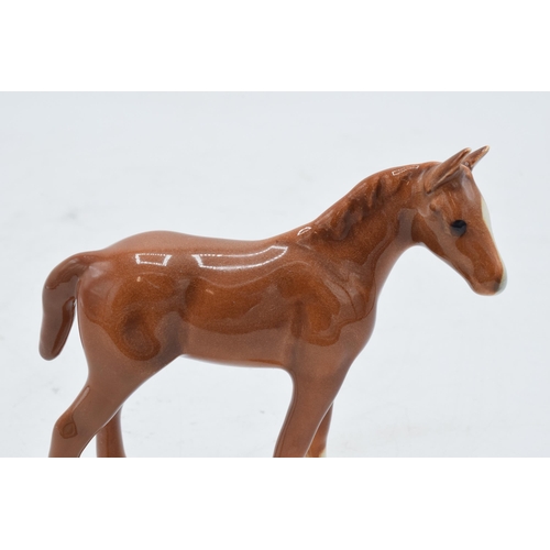 195 - Beswick chestnut thoroughbred foal facing right 1817. 8cm tall. In good condition with no obvious da... 