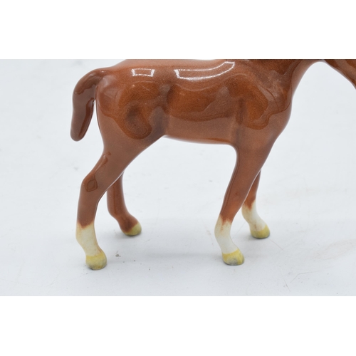 195 - Beswick chestnut thoroughbred foal facing right 1817. 8cm tall. In good condition with no obvious da... 