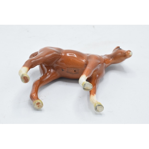 195 - Beswick chestnut thoroughbred foal facing right 1817. 8cm tall. In good condition with no obvious da... 