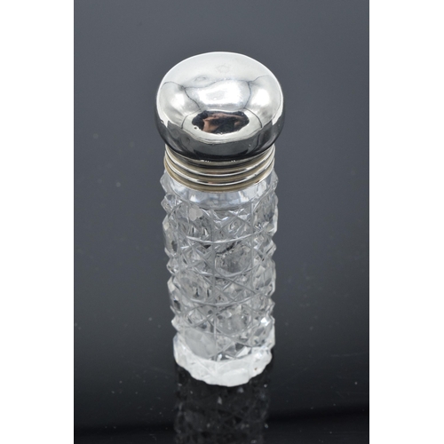 209 - Victorian glass scent bottle with silver screw top lid. Birmingham 1901. 8cm tall. In good condition... 