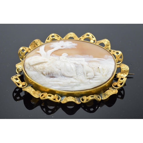 218 - Large Victorian conch shell cameo depicting a lady with her dog in a gilt frame (restoration to the ... 