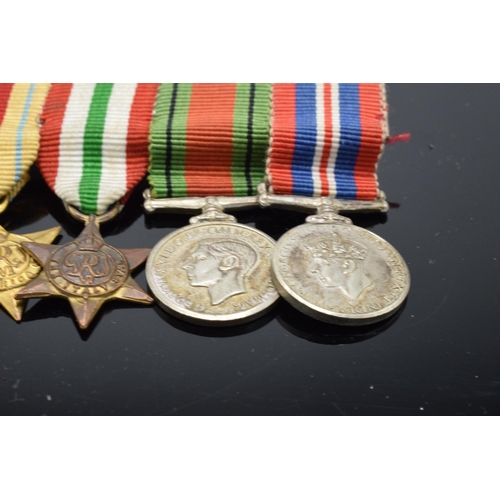 222 - A collection of World War Two (WW2) miniature medals to include The 1939-1945 Star, The Africa Star,... 