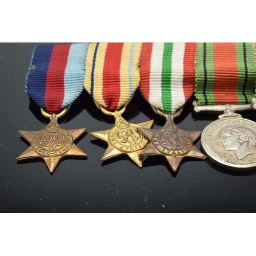 222 - A collection of World War Two (WW2) miniature medals to include The 1939-1945 Star, The Africa Star,... 