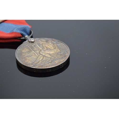 223 - A cased Imperial Service Medal awarded to Edwin Pringle.