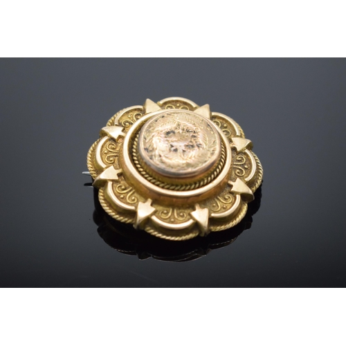 231 - Gold coloured metal Victorian brooch: Gross weight 7.3g, includes glass back, metal pin, and any loa... 