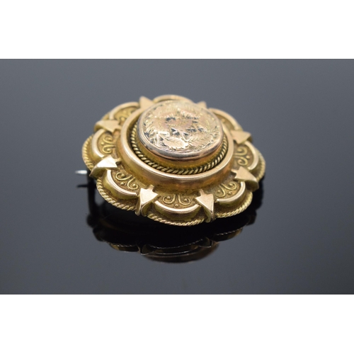 231 - Gold coloured metal Victorian brooch: Gross weight 7.3g, includes glass back, metal pin, and any loa... 