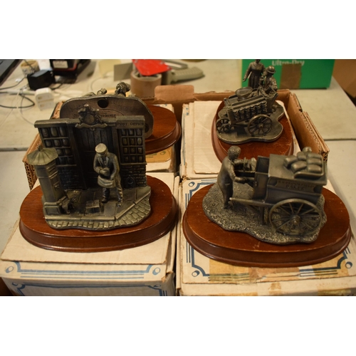 246A - A collection of Tudor Mint pewter models to include Stage Door, Milkman etc together with silver pla... 