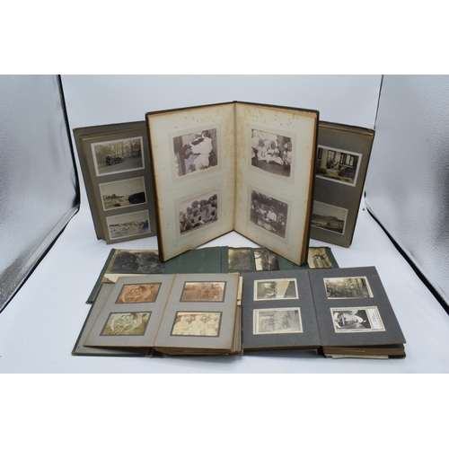 255 - A collection of old photograph albums to include odd photos of local interest such as Croxden Abbey,... 