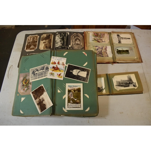 256 - A collection of post card albums to include British and foreign contents to include late 19th and 20... 