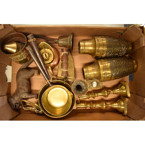 283 - A good collection of brass and metalware to include nut crackers, vases, saucepans, trivet, boxes, t... 