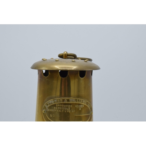 293 - E Thomas and Williams Ltd brass miners lamp. 25cm tall.