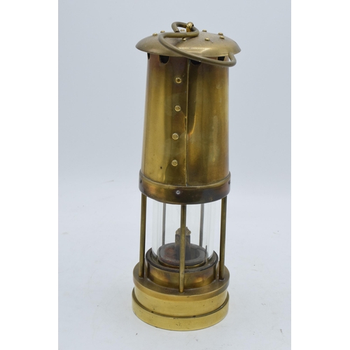 293 - E Thomas and Williams Ltd brass miners lamp. 25cm tall.