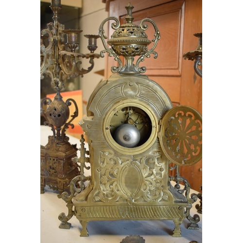 294 - Late 19th / early 20th century gilt brass clock and matching 5 sconce garnitures (3) in a gothic / o... 