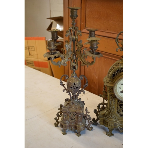 294 - Late 19th / early 20th century gilt brass clock and matching 5 sconce garnitures (3) in a gothic / o... 