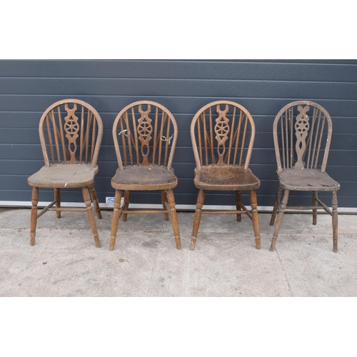 300 - A set of matching farmhouse spindle back chairs x 3 together with a matched example (4). Approx 89cm... 