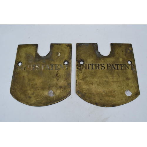 329 - A pair of 20th century brass plaques with 'Smith's Patent' engraved into both. We suspect these are ... 