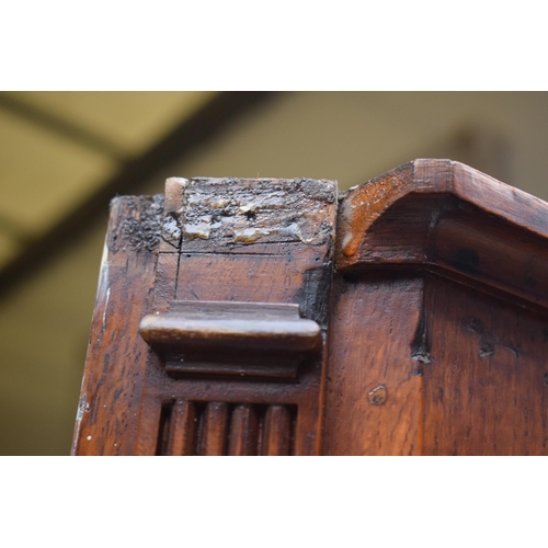 334 - A 19th century inlaid corner cabinet with astragal glazed door with swan neck pediment. 106cm tall. ... 