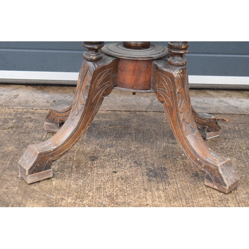 338 - A 19th century walnut tilt-top occasional table with quarter veneered top with inlay decoration on f... 