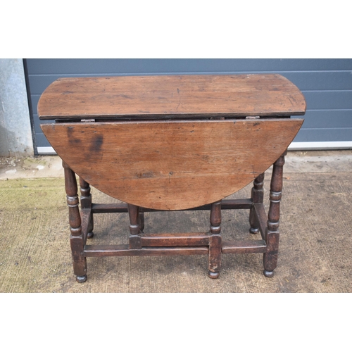 339 - An 18th century thick oak dropleaf gateleg table. 116 x 101 x 77cm tall when extended. In good condi... 