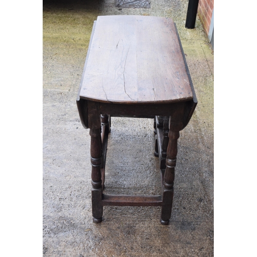 339 - An 18th century thick oak dropleaf gateleg table. 116 x 101 x 77cm tall when extended. In good condi... 