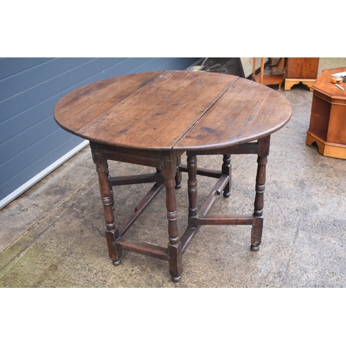 339 - An 18th century thick oak dropleaf gateleg table. 116 x 101 x 77cm tall when extended. In good condi... 