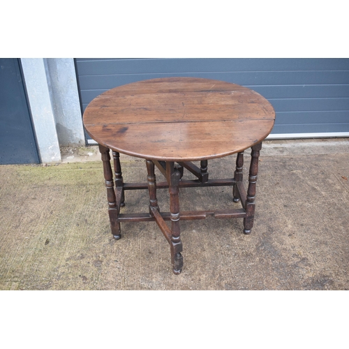 339 - An 18th century thick oak dropleaf gateleg table. 116 x 101 x 77cm tall when extended. In good condi... 