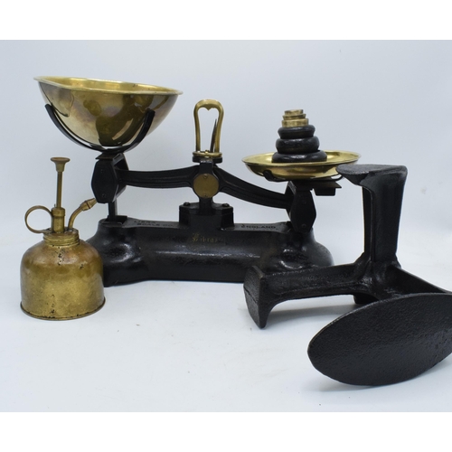 344 - A collection of items to include Libra scales and weights together with an oil can and a cobblers to... 