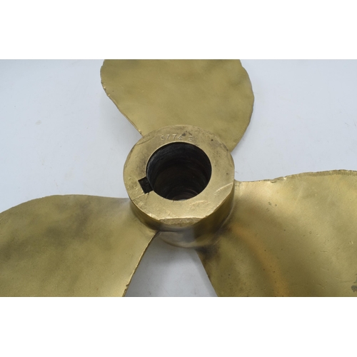 346 - A large and heavy brass three-blade propeller from a boat / ship. 35cm diameter.