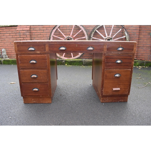 349 - A 20th century knee hole office desk with green leather inset manufactured by Durrant. 137 x 69 x 77... 