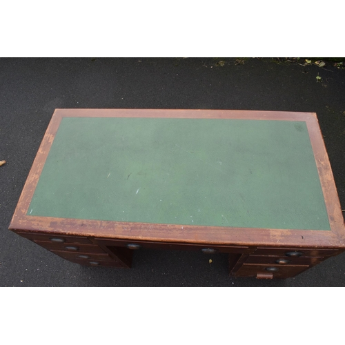 349 - A 20th century knee hole office desk with green leather inset manufactured by Durrant. 137 x 69 x 77... 