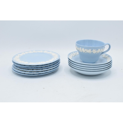 60 - A collection of Wedgwood Queensware tea ware to consist of a tea cup, 5 saucers and 6 side plates (1... 