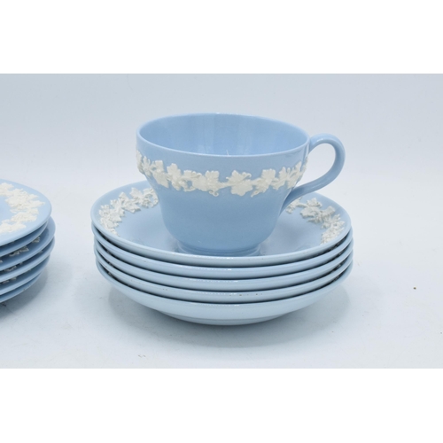 60 - A collection of Wedgwood Queensware tea ware to consist of a tea cup, 5 saucers and 6 side plates (1... 