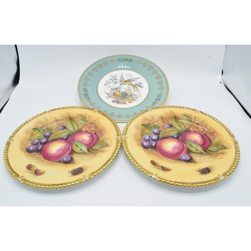 64 - A pair of Aynsley Orchard Gold 26.5cm diameter plates signed by D. Jones together with an Aynsley pl... 