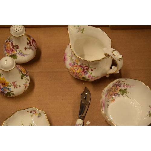 65 - A collection of Royal Crown Derby items in the Derby Posies design to include pin trays, cruets, jug... 