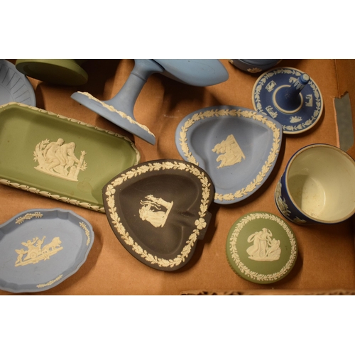 69 - A collection of Wedgwood Jasperware in various colours to include dip blue, blue, sage green and bla... 