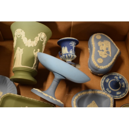 69 - A collection of Wedgwood Jasperware in various colours to include dip blue, blue, sage green and bla... 