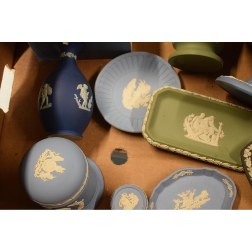 69 - A collection of Wedgwood Jasperware in various colours to include dip blue, blue, sage green and bla... 