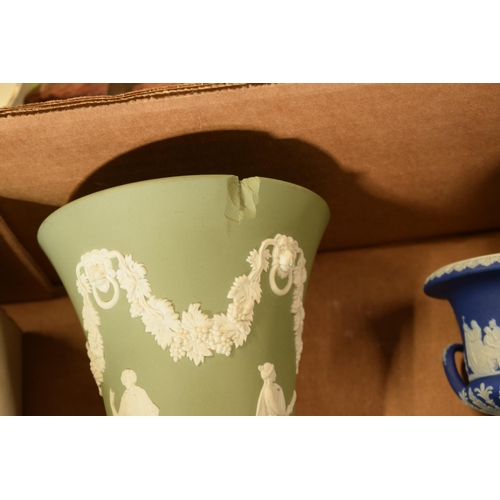 69 - A collection of Wedgwood Jasperware in various colours to include dip blue, blue, sage green and bla... 