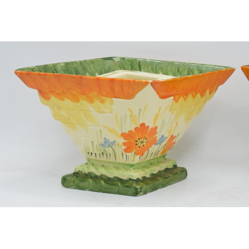 83 - A pair of Myott Son and Co Art Deco diamond planters / flower bowls both with floral decoration (2).... 